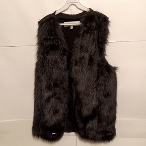 A black fur vest women extra large